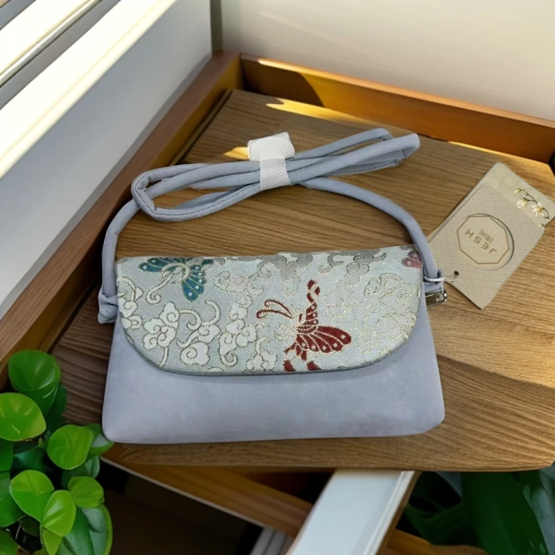 【七彩蝴蝶】花位随机民族风气质手提时尚竹节口袋斜跨手拎包313