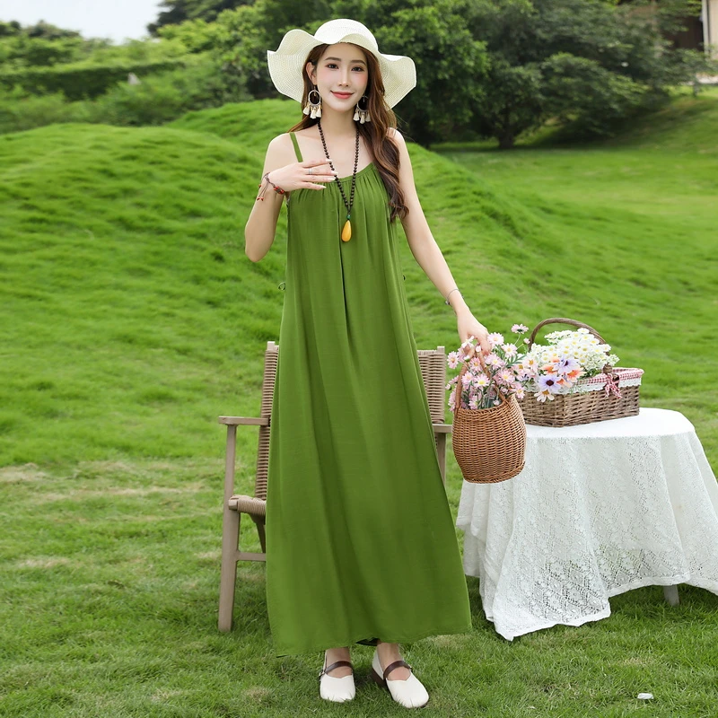 纯色棉绸吊带连衣裙女长款新款森系高级感超好看海边度假2025裙子