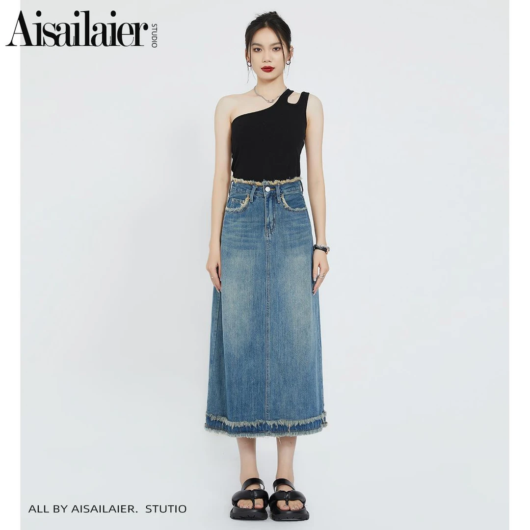 设计感高腰牛仔半身裙女中长款2026年春秋新款宽松a字毛边裙子潮