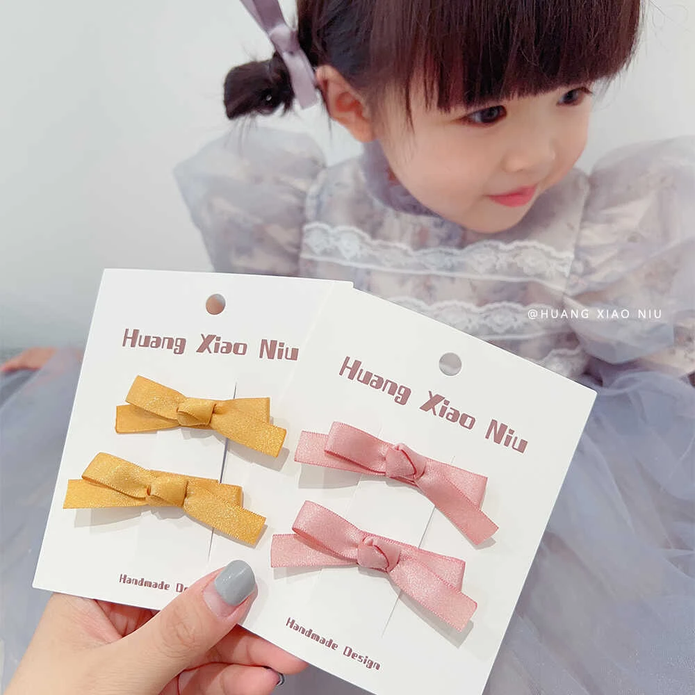 黄小妞 韩版燕尾蝴蝶结对夹夏季宝宝儿童百搭发饰可爱公主发卡