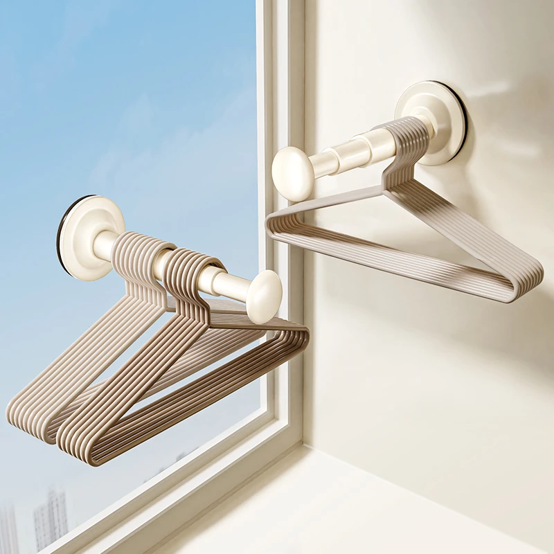 衣架收纳神器家用阳台多功能免打孔伸缩晾衣架墙上壁挂整理置物架
