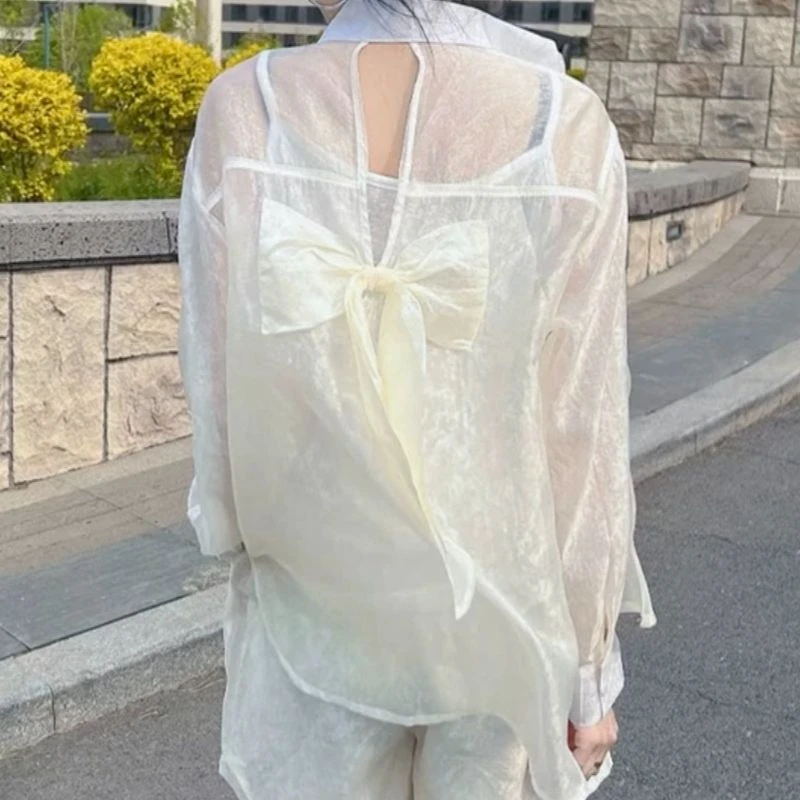 KIKI严选:12050-HJ家欧货蝴蝶结镂空宽松长袖衬衫+短裤防嗮两件套