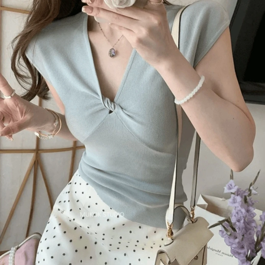 迈沃格显瘦气质针织不规则小众修身v领收腰时尚洋气设计感上衣