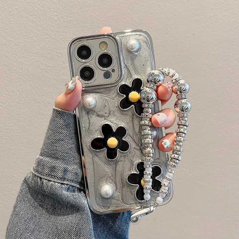 ins风立体花朵适用苹果15pro手机壳网红女款滴胶创意带手链高级感