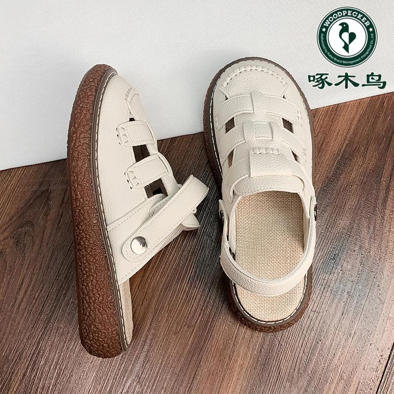 啄木鸟包头罗马凉鞋女夏季2025新款厚底孕妇软底平底镂空沙滩鞋