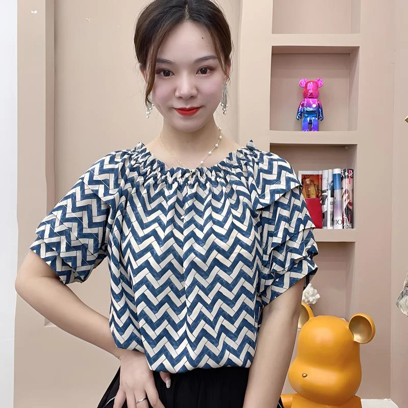 泡泡袖上衣女碎花时尚气质夏季宽松复古印花一字领短袖洋气小衫