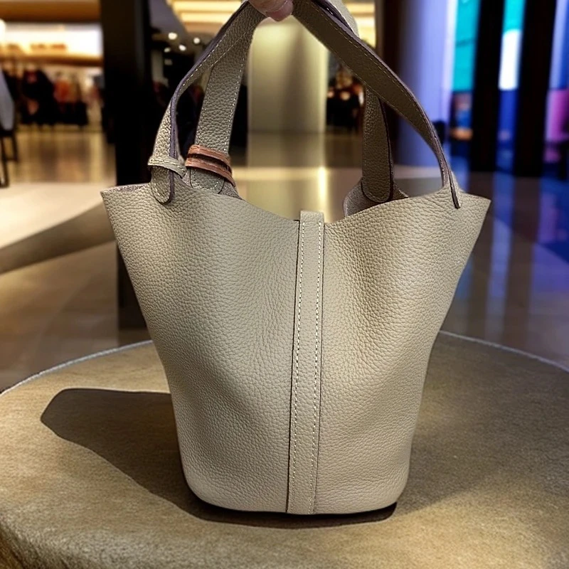 头层牛皮菜篮蓝19cm手提包包