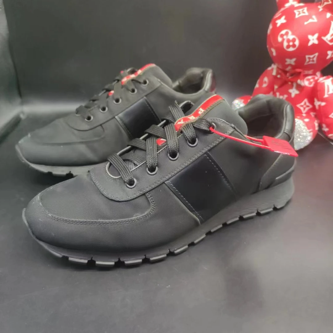 【147折扣】PRADA/普拉达 男款黑武士时尚百搭低帮潮流41.5欧运动鞋