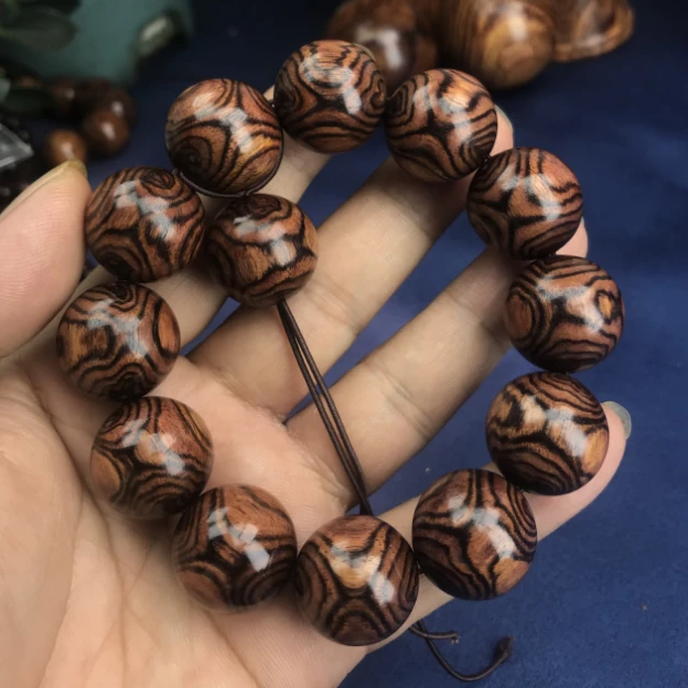 正宗精品海南黄花梨2.0满纹X纹对眼圆珠男士降香黄檀手串麻点品牌