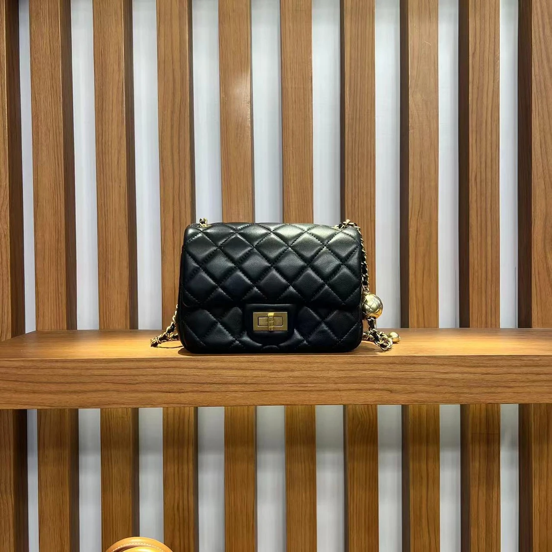 伯金哥 机缝真皮包单肩包球球