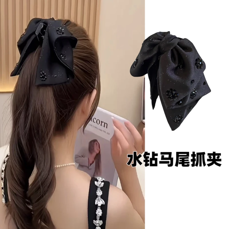 高级感星光璀璨马尾夹女新款蝴蝶结简约时尚发夹后脑勺抓夹头饰