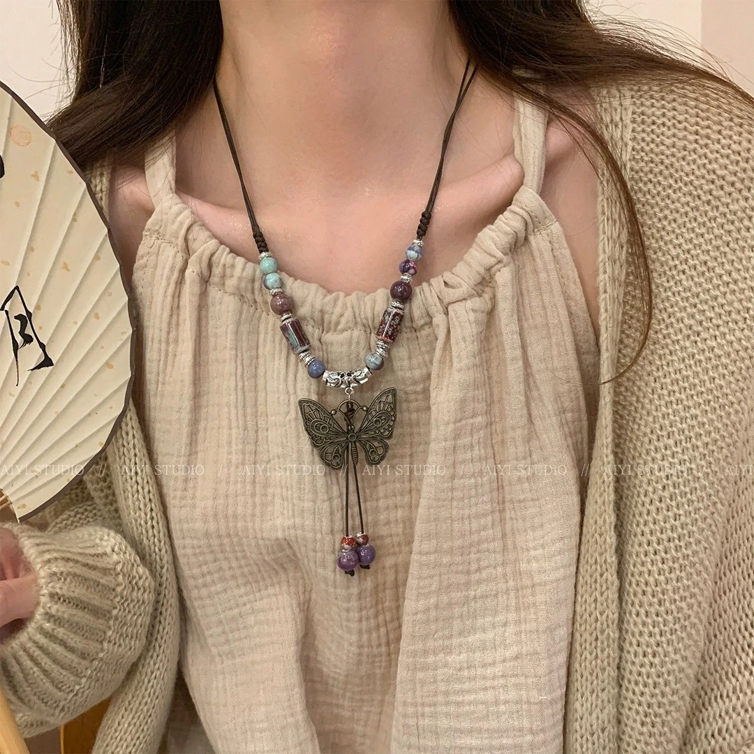 复古民族风陶瓷蝴蝶铃铛吊坠项链女新中式流苏编绳锁骨链长款毛衣