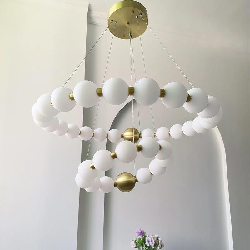 法式奶油风魔豆轻奢卧室挑空复式楼客厅简约设计师圆形珍珠串吊灯