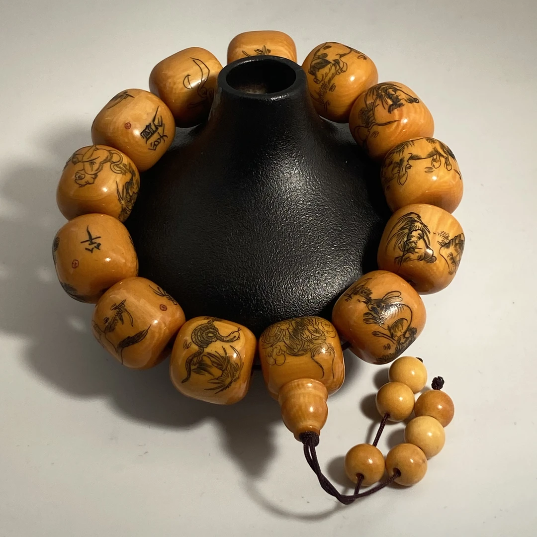 猛犸牙雕港工回流手串十二生肖16*17mm文玩假一罚四w5334