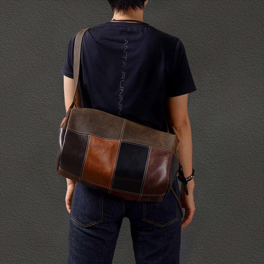 二十四街复古拼接个性牛皮撞色水桶包真皮运动包男款真皮斜挎背包