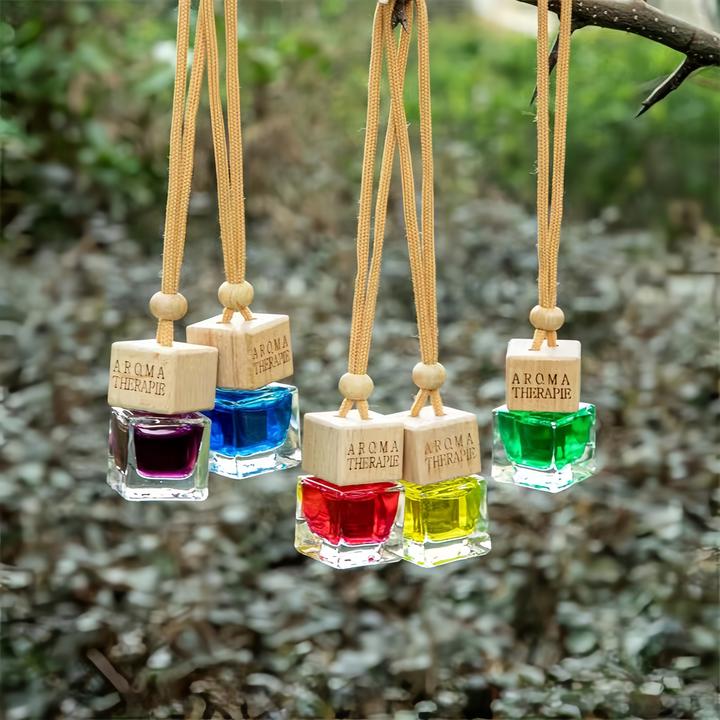 车载香薰瓶车载香水清新车内用挂件香薰精油持久淡香氛古龙除异味