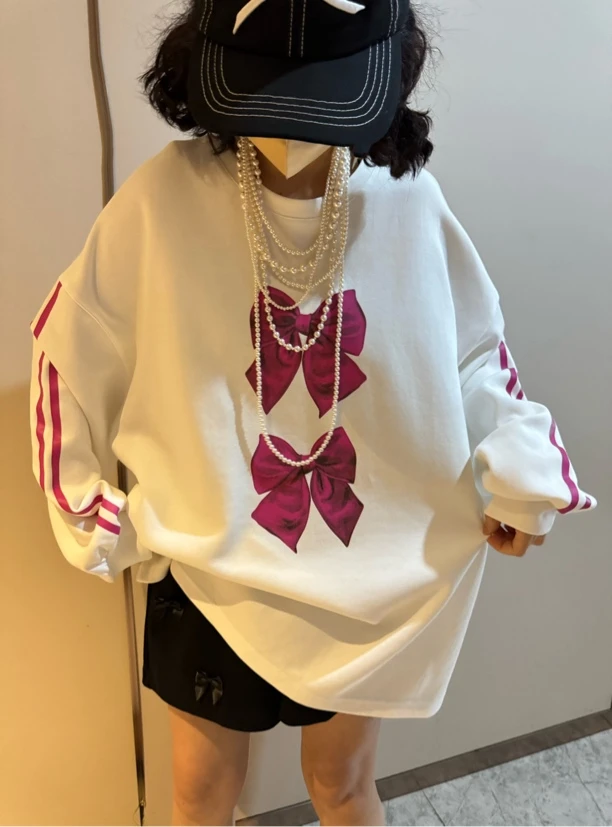 2024春季新款韩版潮女装圆领侧边条纹蝴蝶结图案休闲大版长袖T恤