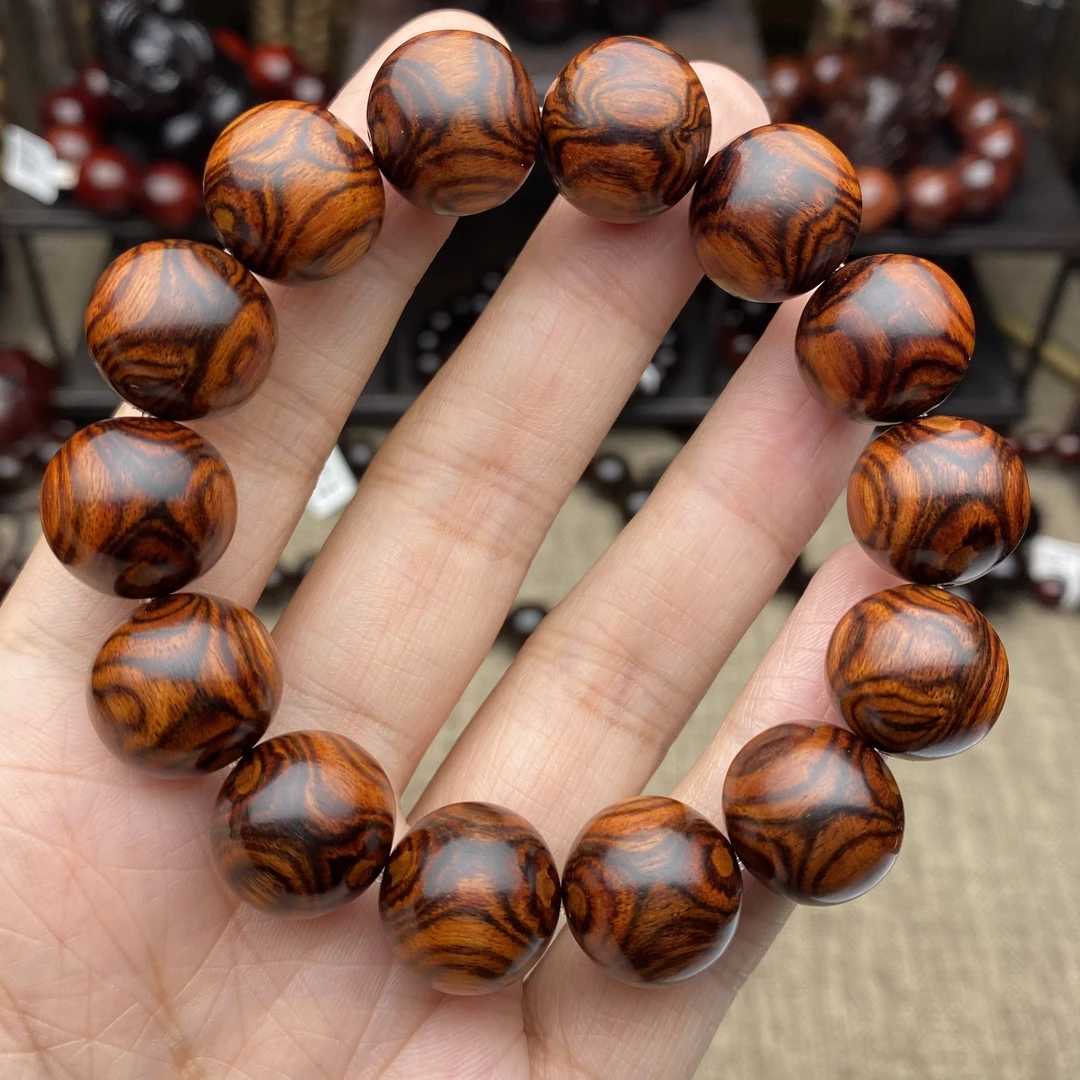 海南黄花梨  满纹对眼鬼脸1.6cm*14颗 手串质感细腻精选好物文玩