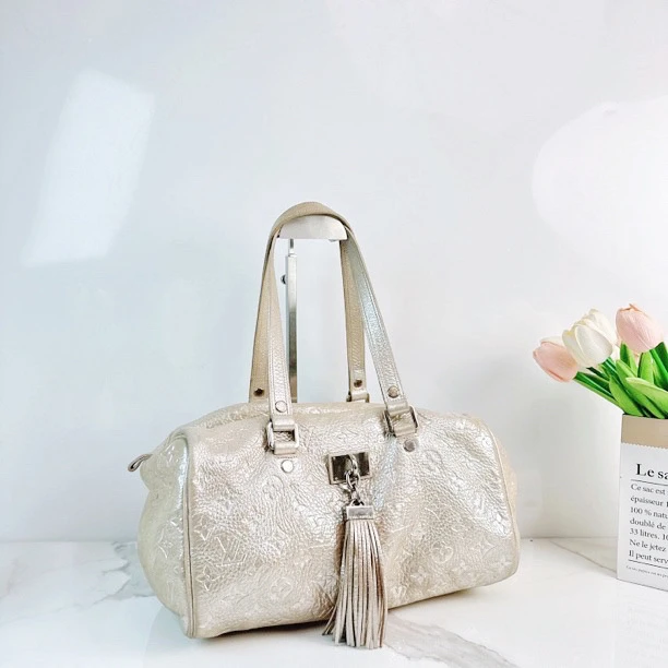 95新 LouisVuitton/路易威登 路易威登流苏月光女神单肩包/Niko
