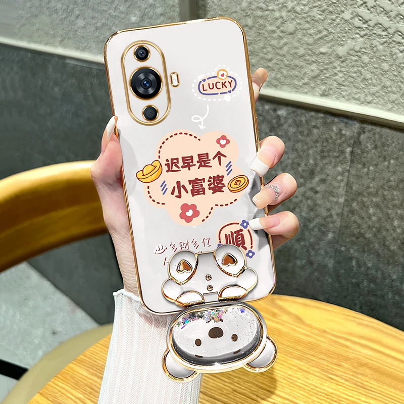 适用华为nova12活力版手机壳迟早是个小富婆流沙熊镜子支架硅胶女