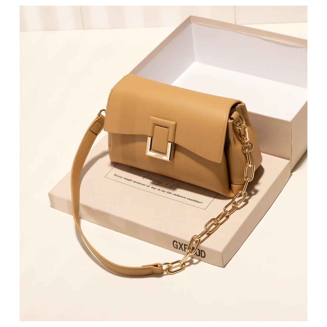 GXFMOD新款质感通勤牛皮法棍包2025复古小众设计女包包单肩斜挎包