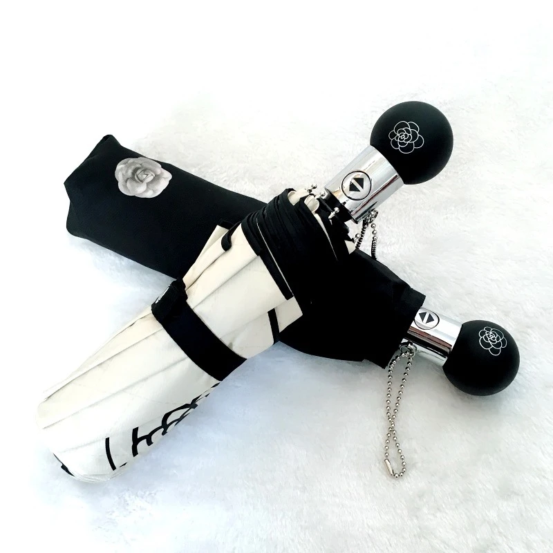 山茶花黑胶加固8骨全自动简约小香三折叠晴雨伞两用伞女神防晒紫