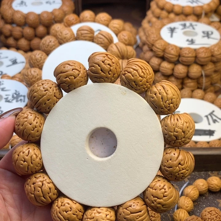 把***哥桃核吊坠盘锦肌肉