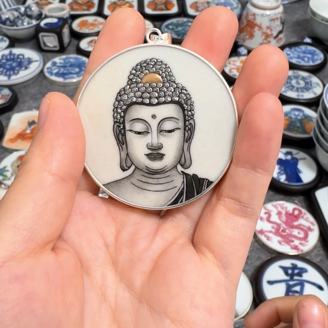 月***夏瓷片粉彩大日佛头挂件