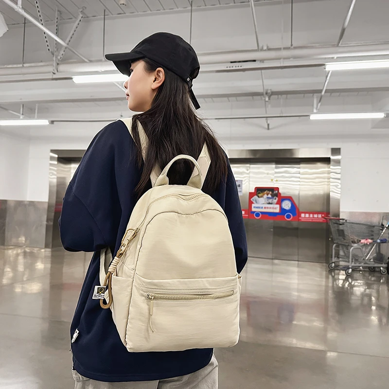 纯色双肩包女旅游轻便时尚简约大学生书包高级感小众百搭通勤背包