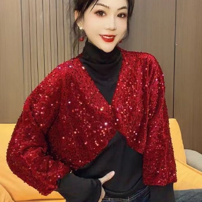 91546#洋气重工亮片拼接衫