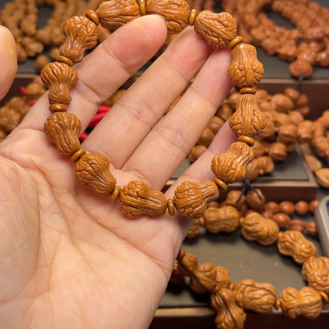 李***李桃核手串龙纹桃核8