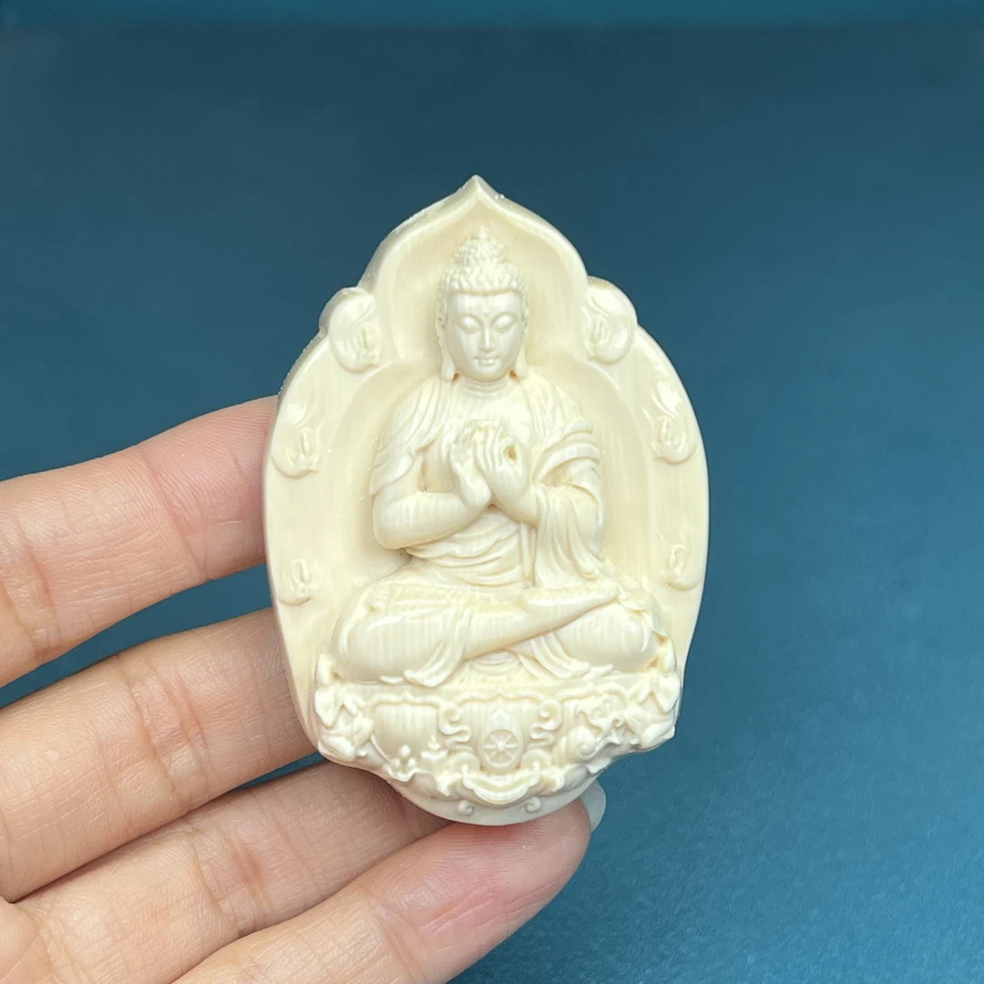 k9700【北京雕刻师-青松】天然猛犸牙雕刻阿弥陀佛41x59x19mm 43克