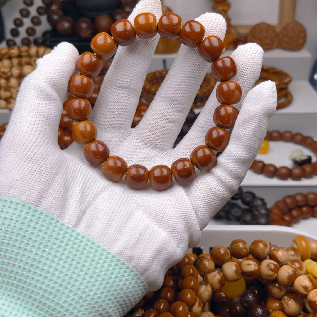 手串紫金鼠没*?紫金鼠实心差价