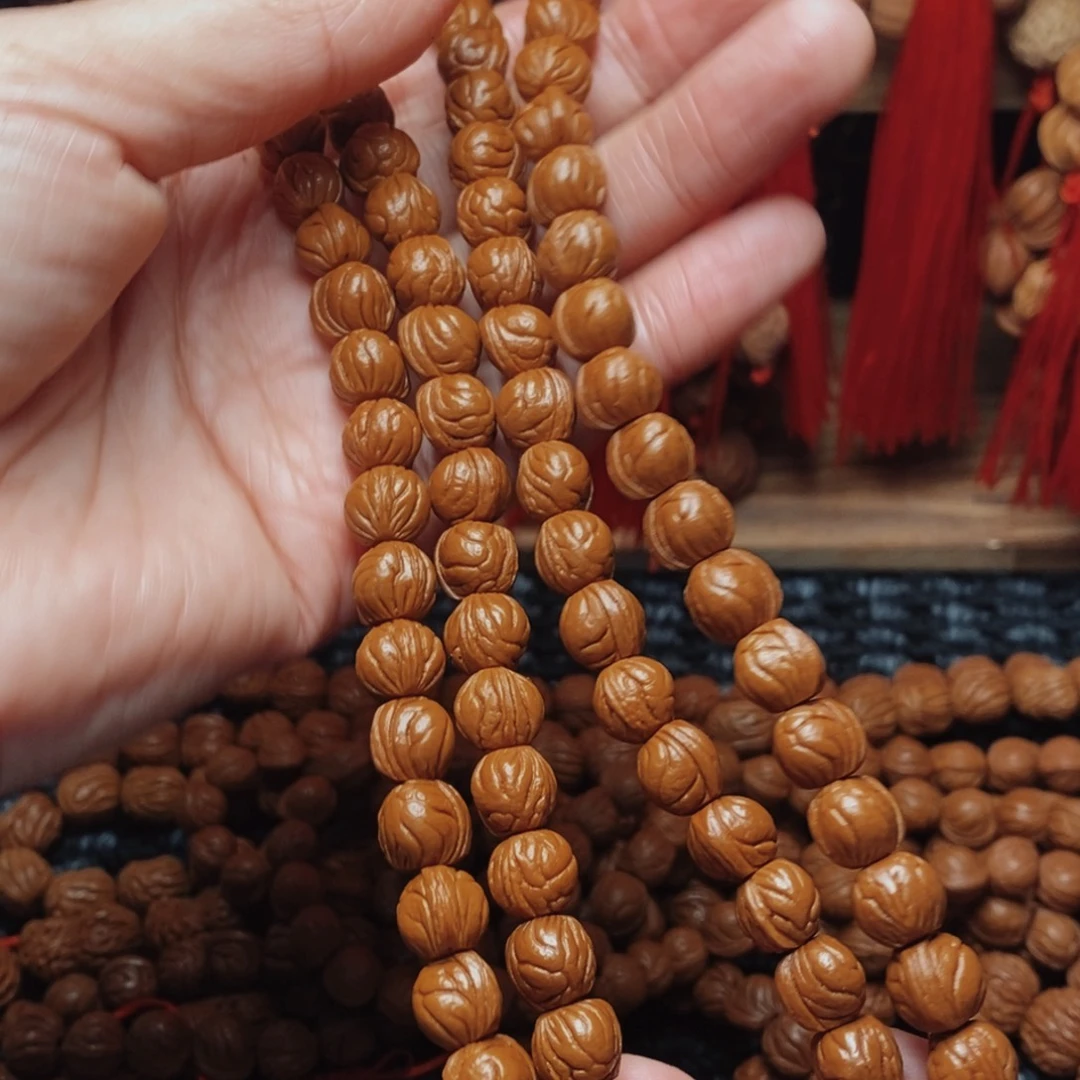 劉***囍桃核吊坠桃枭脖挂