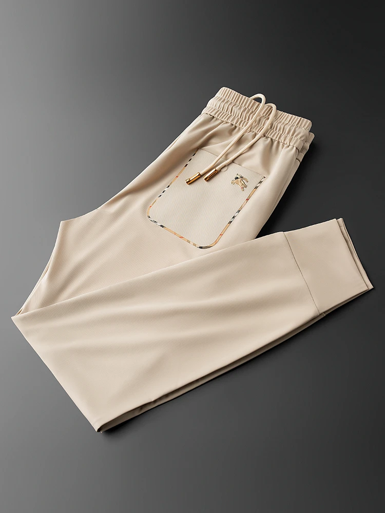 新款2025男士薄款休闲裤夏季战马男士修身束脚卡其色运动卫裤子潮