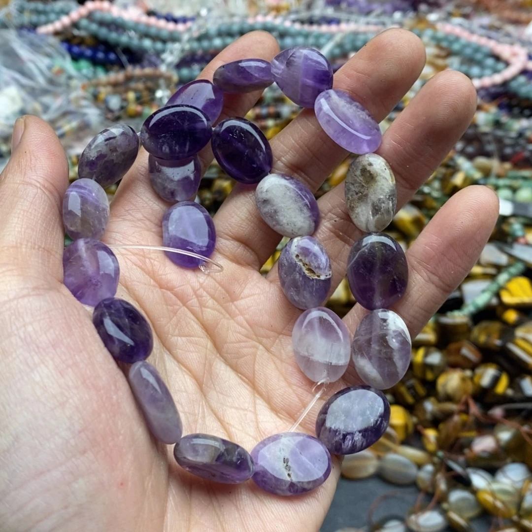 玛瑙/玉髓未镶嵌珠宝半成品一条天然紫水晶椭圆微瑕A52