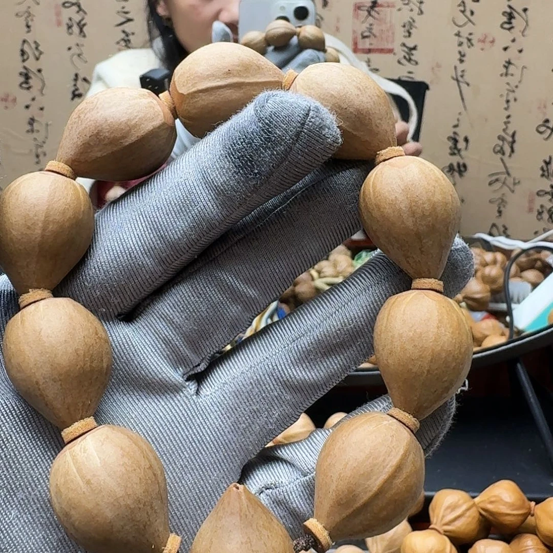 ᥴ***c手串橄榄核德庆王