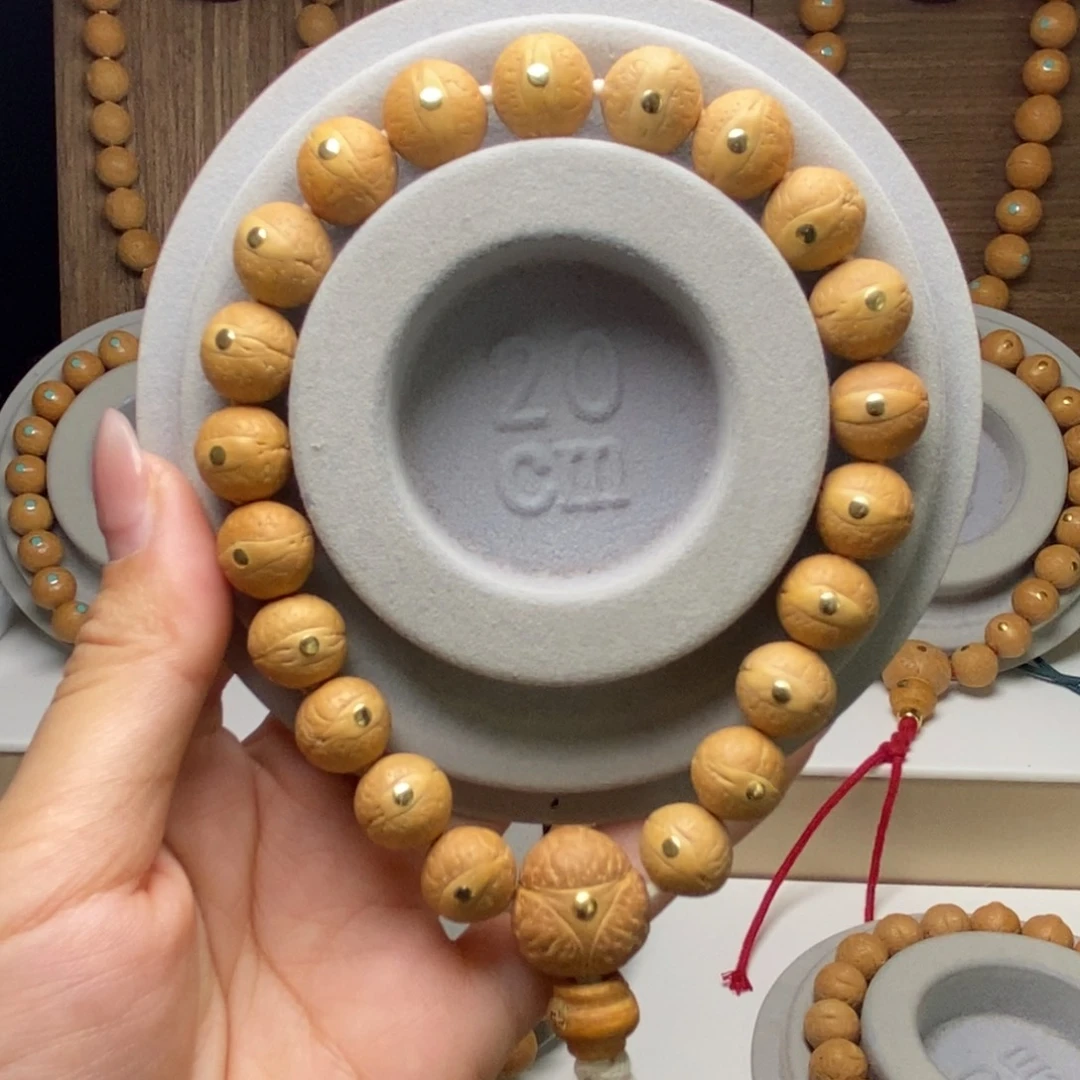 吊坠凤眼菩提12铜手串