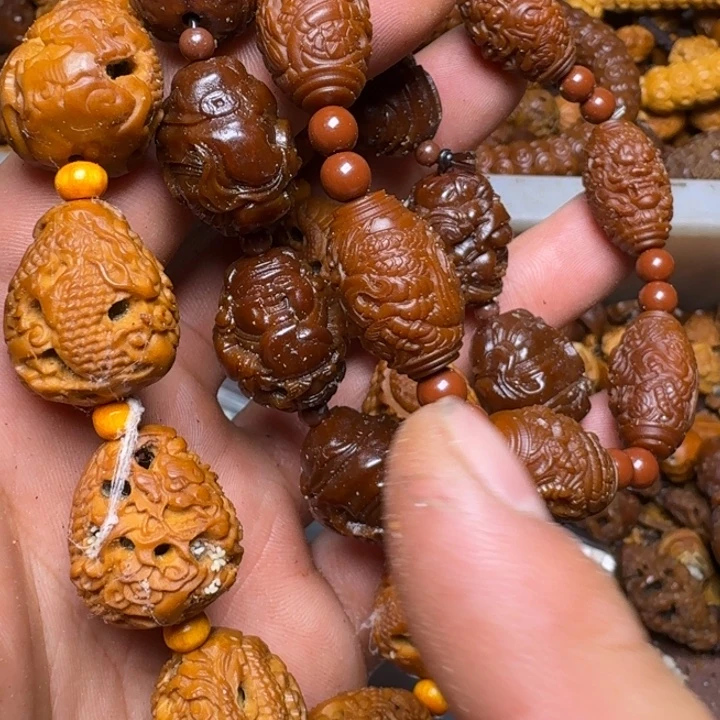 啾***呀橄榄核手串我的心