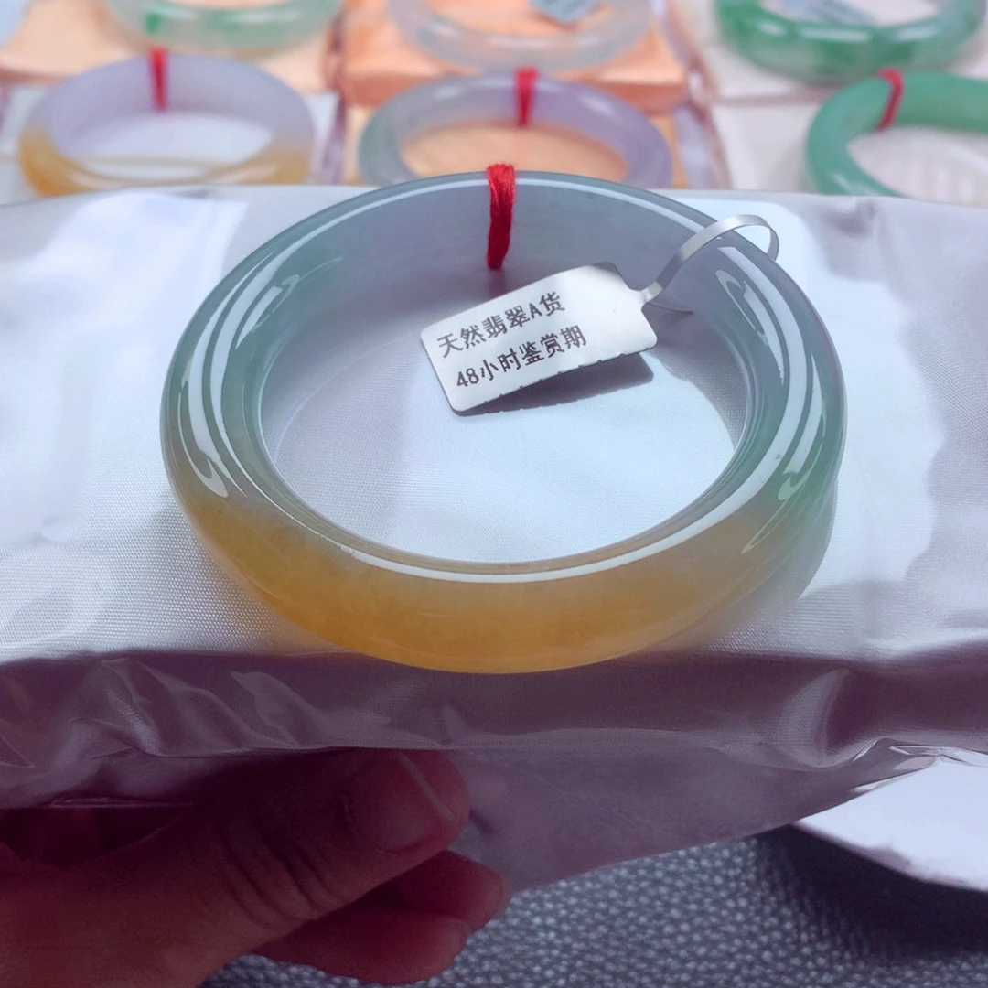 翡翠未镶嵌手镯（圆镯）52.9冰黄加绿绝美千金难买A