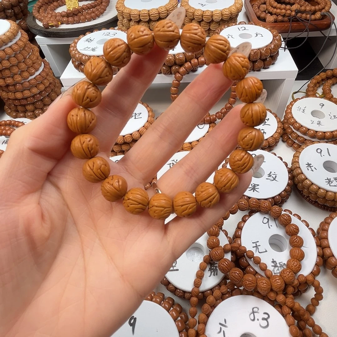 空***空手串桃核桃核光珠