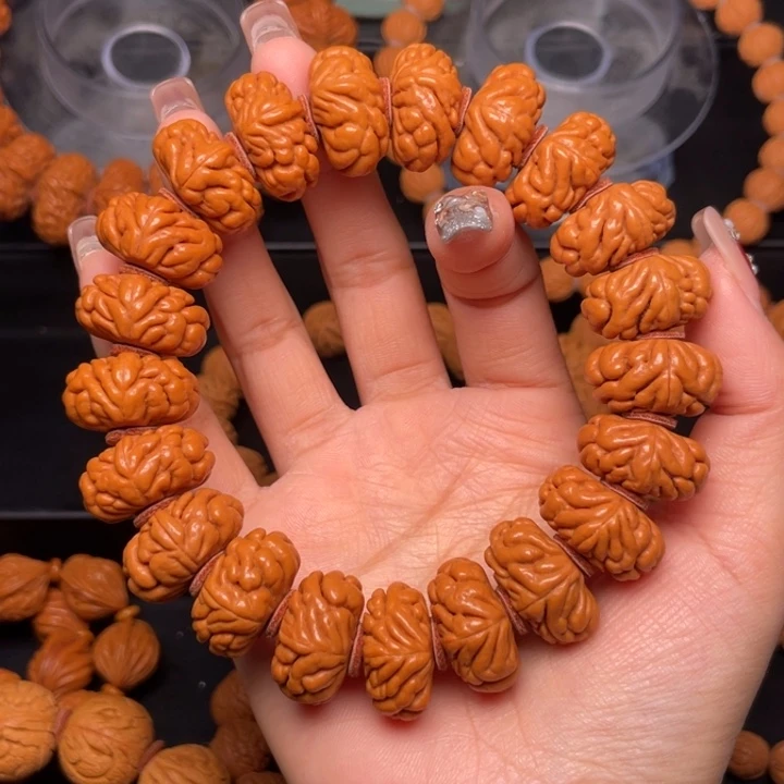 桃核手串21尺寸飞碟豹子头（15号链接）