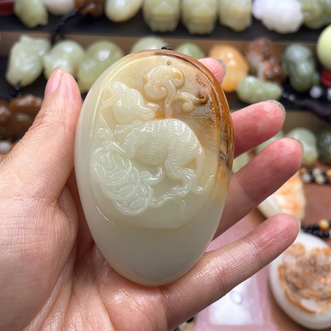 崇***哥石材天然古青石手把件