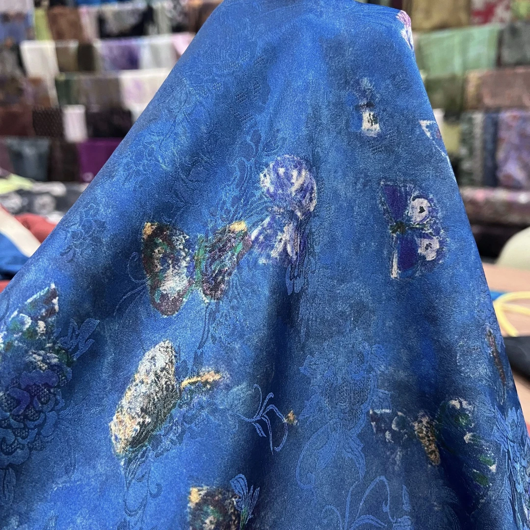 【44】蓝底彩蝶红云纱提花面料