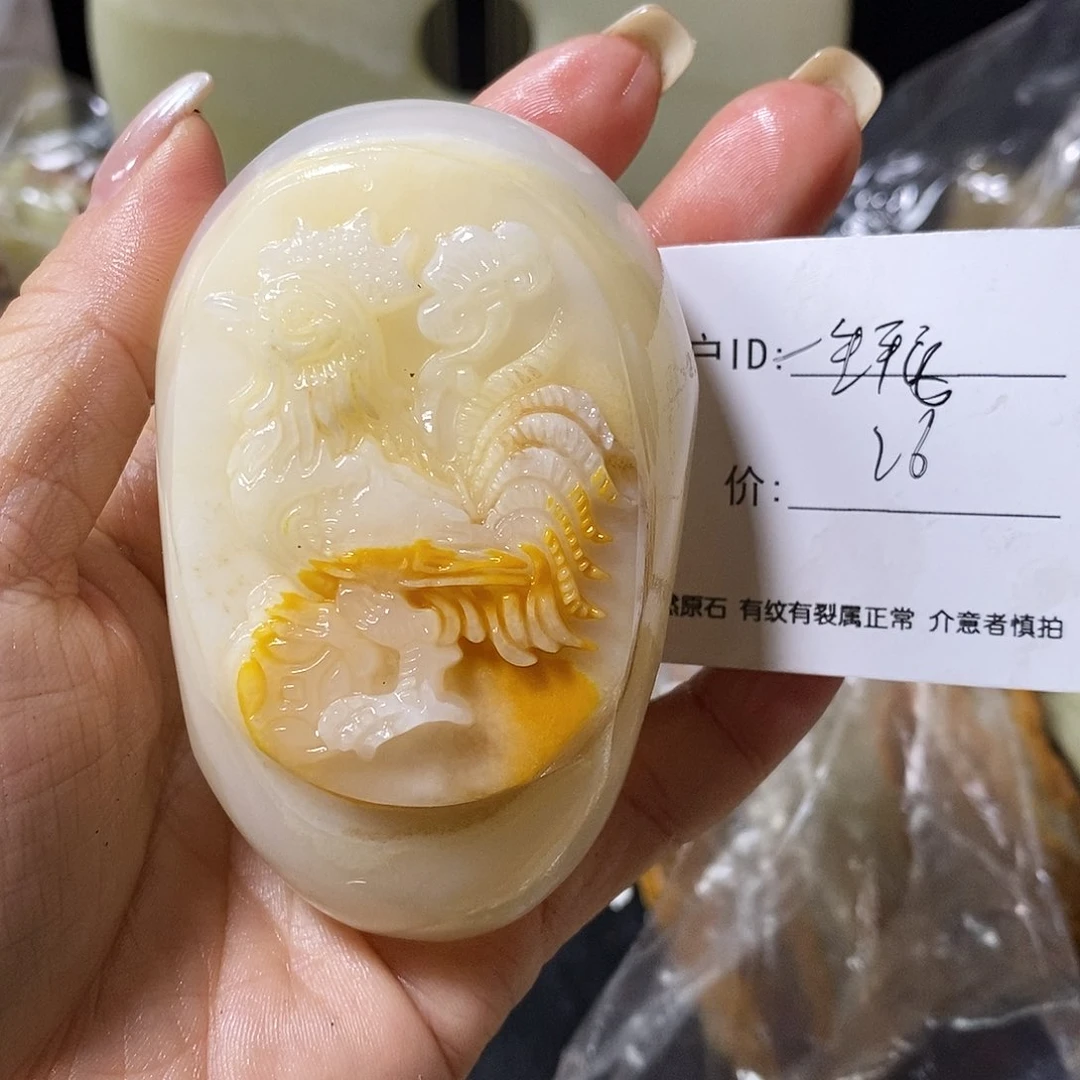 石材一**安古青石手把件