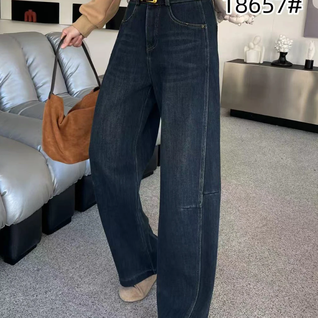 18657冬季时尚潮流百搭加绒显瘦弯刀牛仔裤