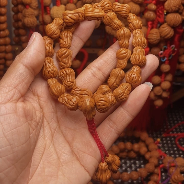 木质类龙纹桃枭挂件