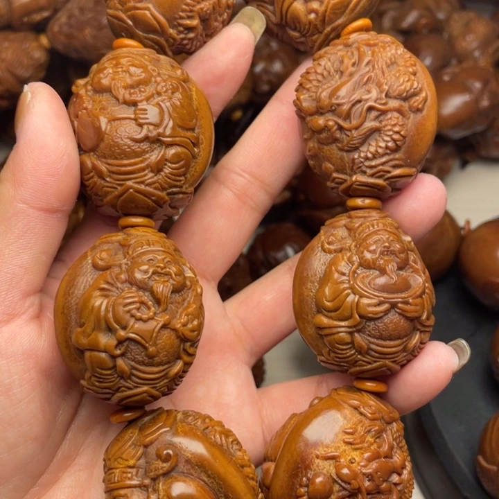 龙***跃橄榄核吊坠橄榄核手持