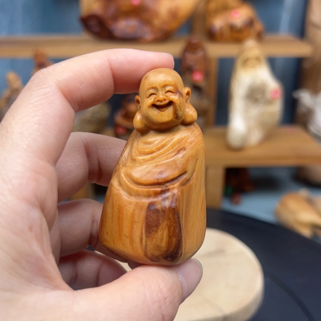 木蓝***空崖柏木摆件手把件