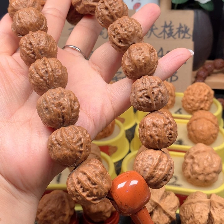 桃核把件手持23尺寸